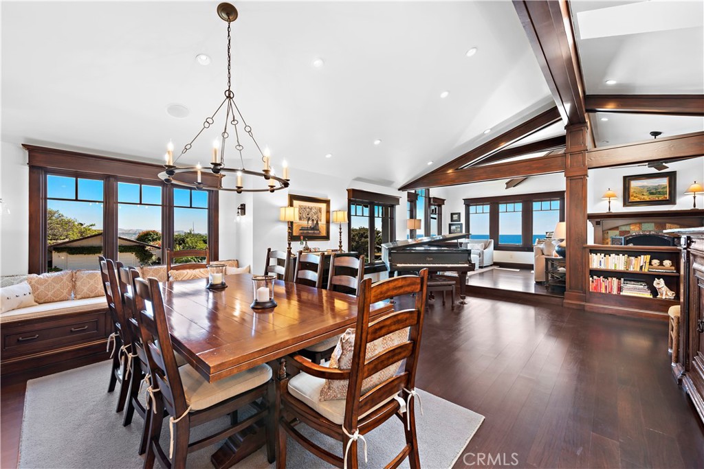 4 Monarch Bay Drive Dana Point, CA 92629 - Photo 8 of 34 a dining room with furniture wooden floor a chandelier and a rug