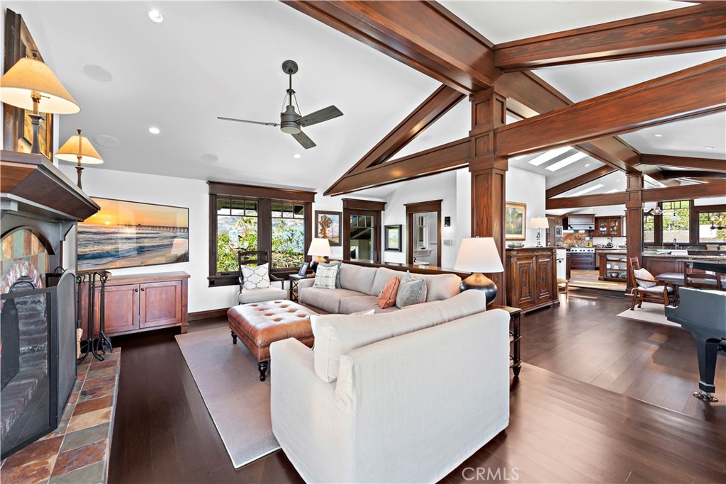 4 Monarch Bay Drive Dana Point, CA 92629 - Photo 10 of 34 a living room with furniture fireplace and a large window