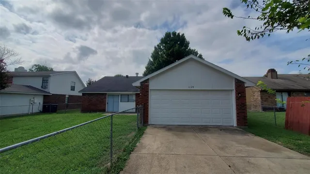 a view of outdoor space yard and garage