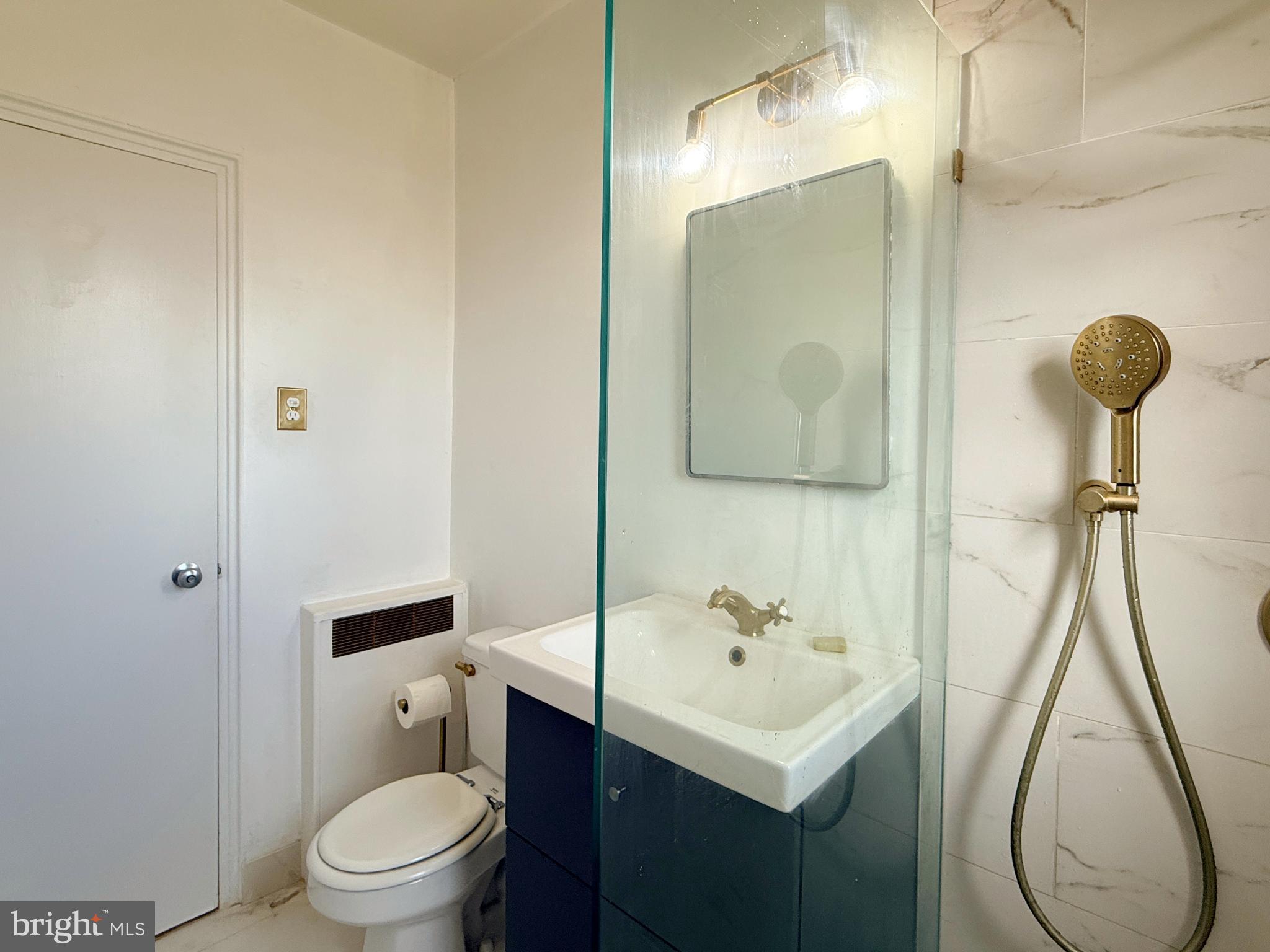 2500 Q Street Northwest, Unit 529 Washington, DC 20007 - Photo 18 of 29 Sleek modern bathroom with elegant finishes.