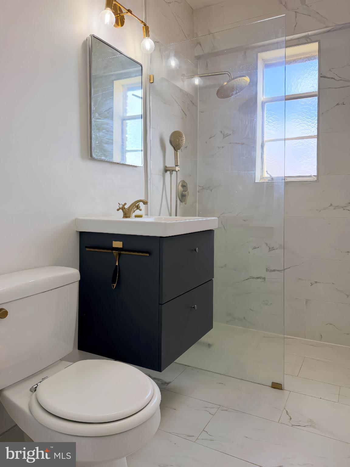 2500 Q Street Northwest, Unit 529 Washington, DC 20007 - Photo 19 of 29 Sleek modern bathroom with elegant finishes.