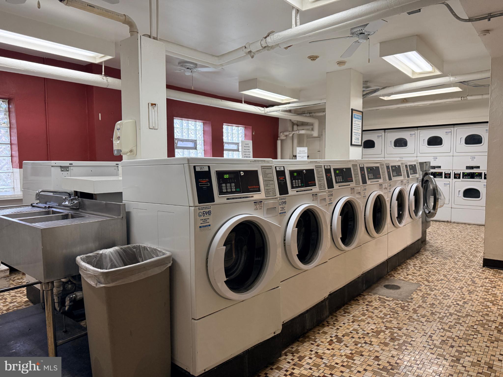 2500 Q Street Northwest, Unit 529 Washington, DC 20007 - Photo 25 of 29 Bright and functional laundry room space.