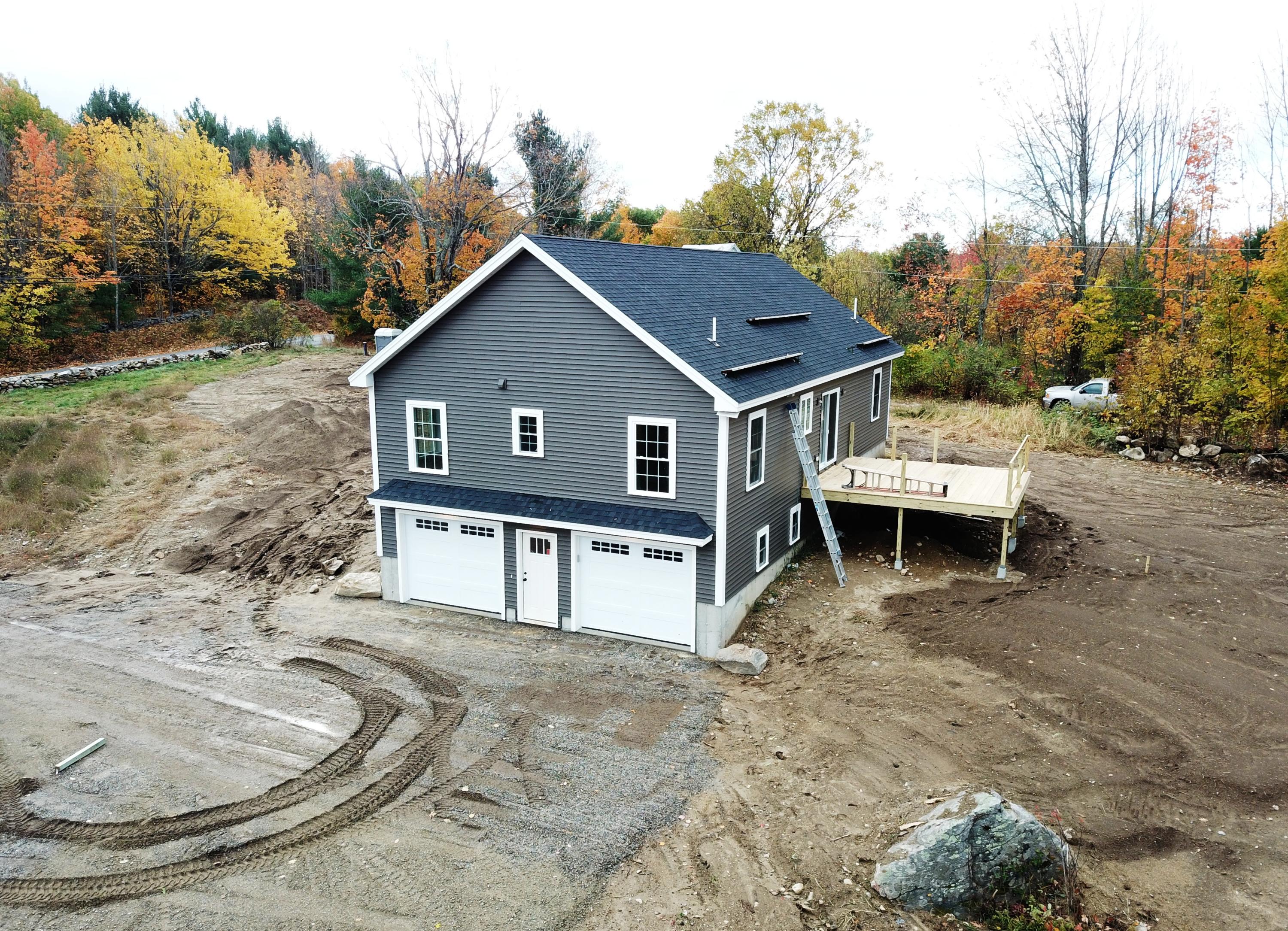 209 Ossipee Hill Road East Waterboro, ME 04030 - Photo 2 of 23 Beautiful overhead doors!