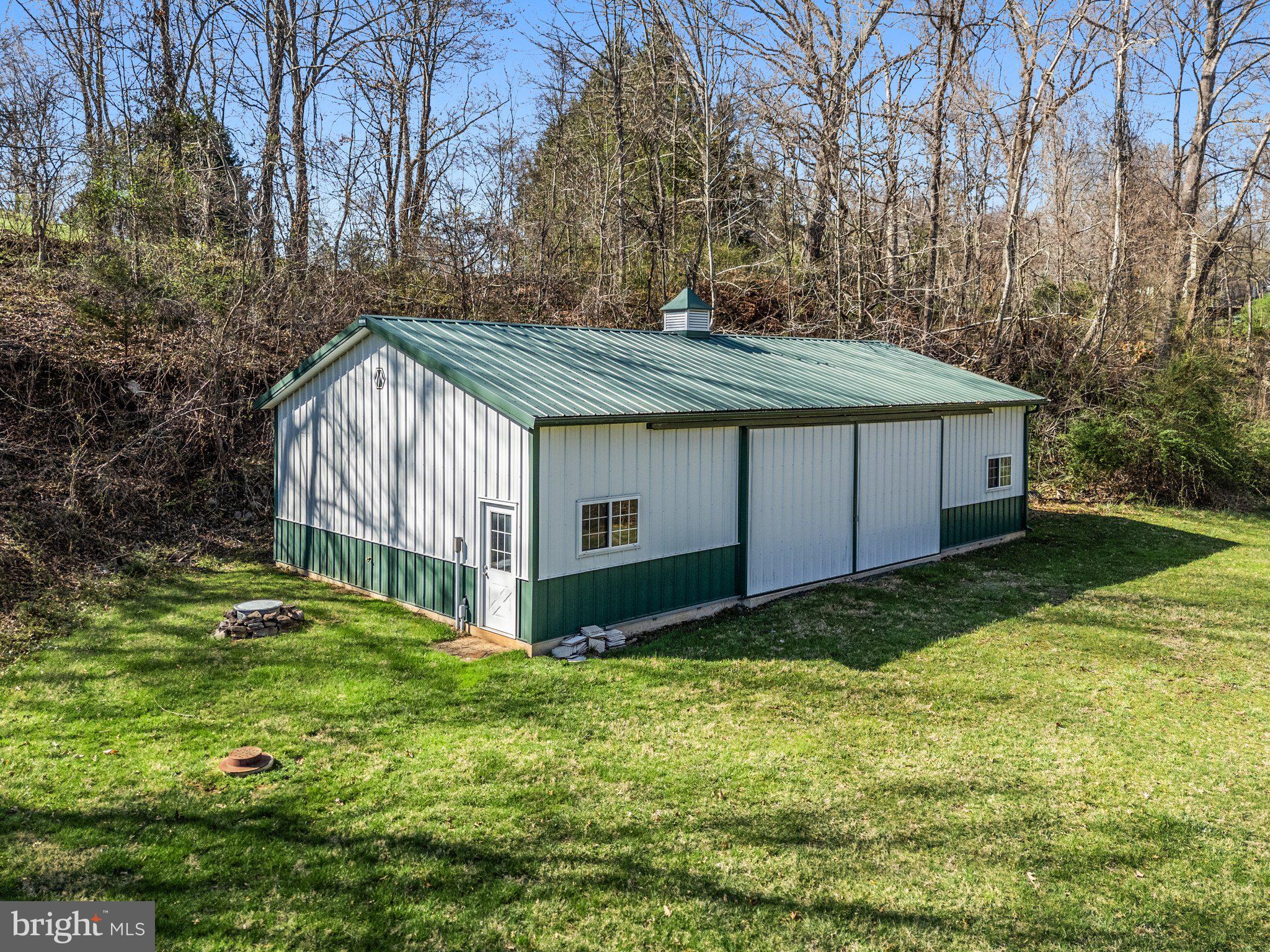 2547 Halfway Road The Plains, VA 20198 - Photo 78 of 90 a backyard of a house with yard and trampoline