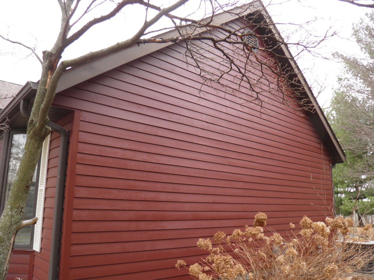 2264 Ridgeview Drive Muscatine, IA 52761 - Photo 28 of 33 a view of a brick house with a small space