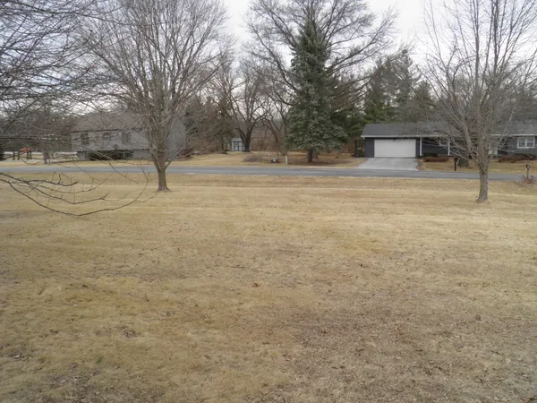 a front view of a house with a garage