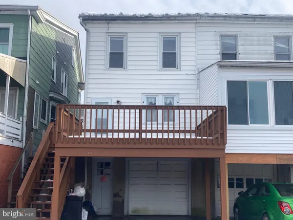 a view of a house with a deck