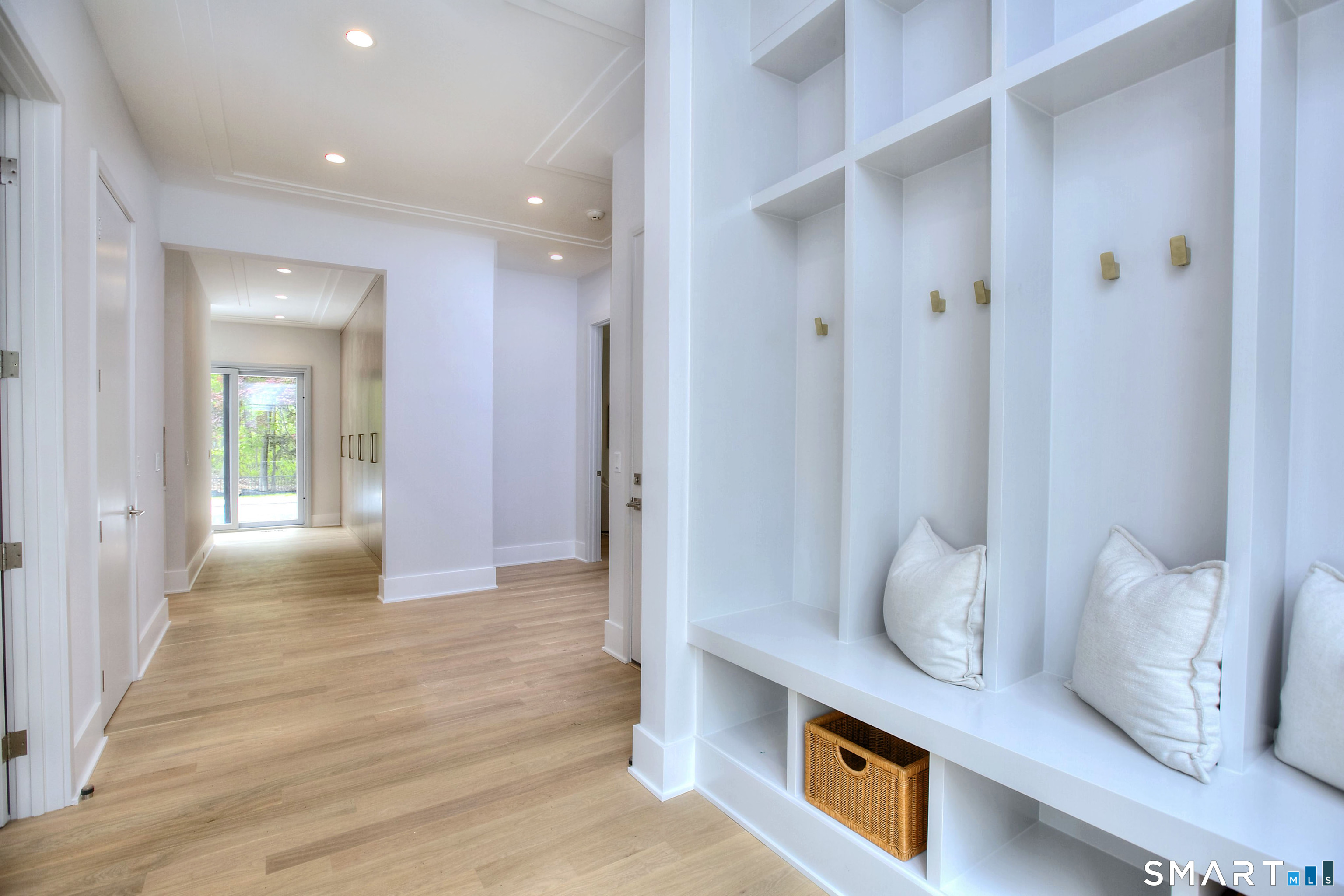 159 Easton Road Westport, CT 06880 - Photo 22 of 40 And of course, our mudroom has cubbies for convenience. And a coat closet. And one of two powder rooms on the first floor.