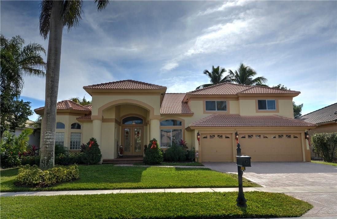 10582 East Key Drive Boca Raton, FL 33498 - Photo 2 of 55 Front Facing Home View
