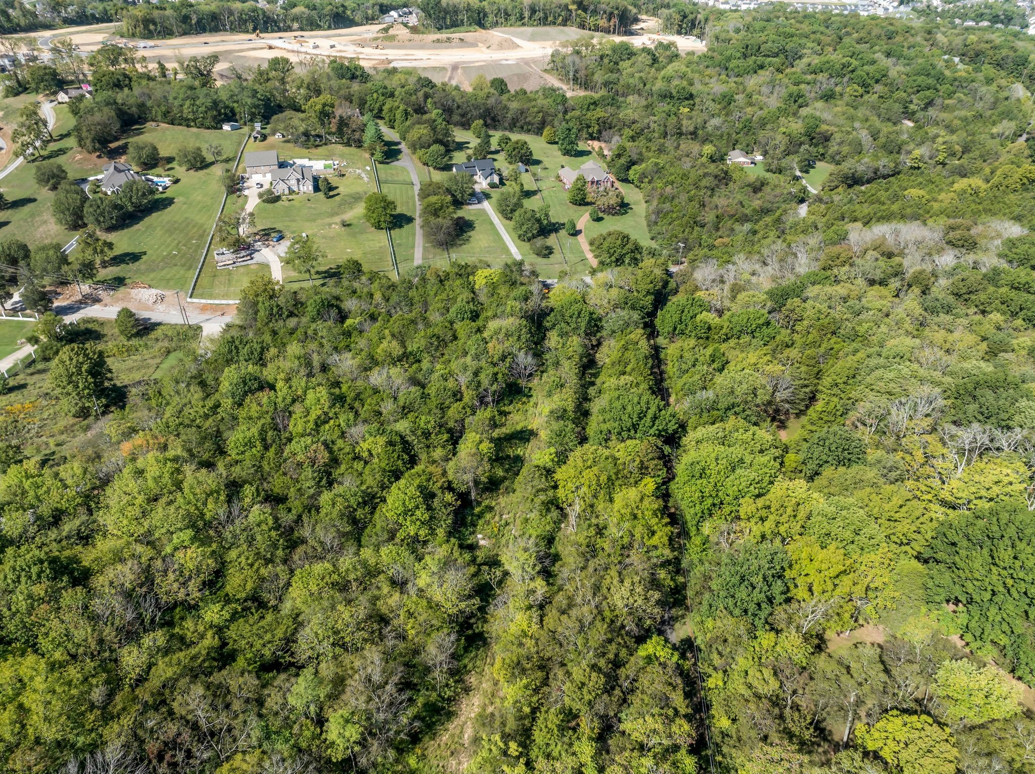 5882 Cane Ridge Road Antioch, TN 37013 - Photo 7 of 17 an aerial view of residential houses with outdoor space and trees
