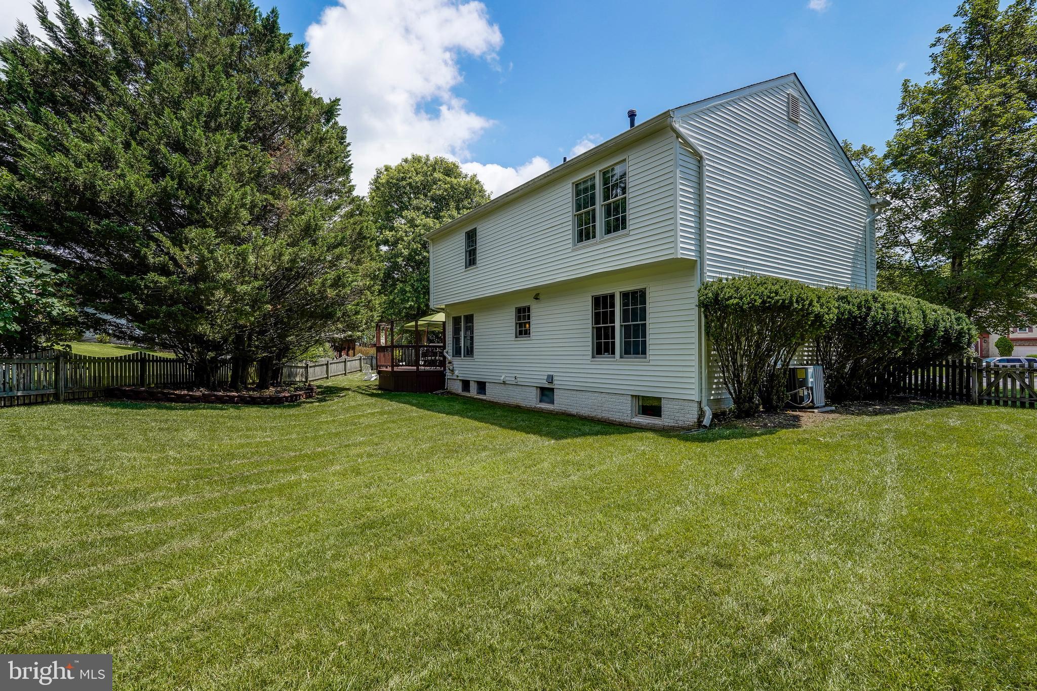 701 Stratford Manor Terrace Silver Spring, MD 20905 - Photo 36 of 43 a view of a house with backyard and garden