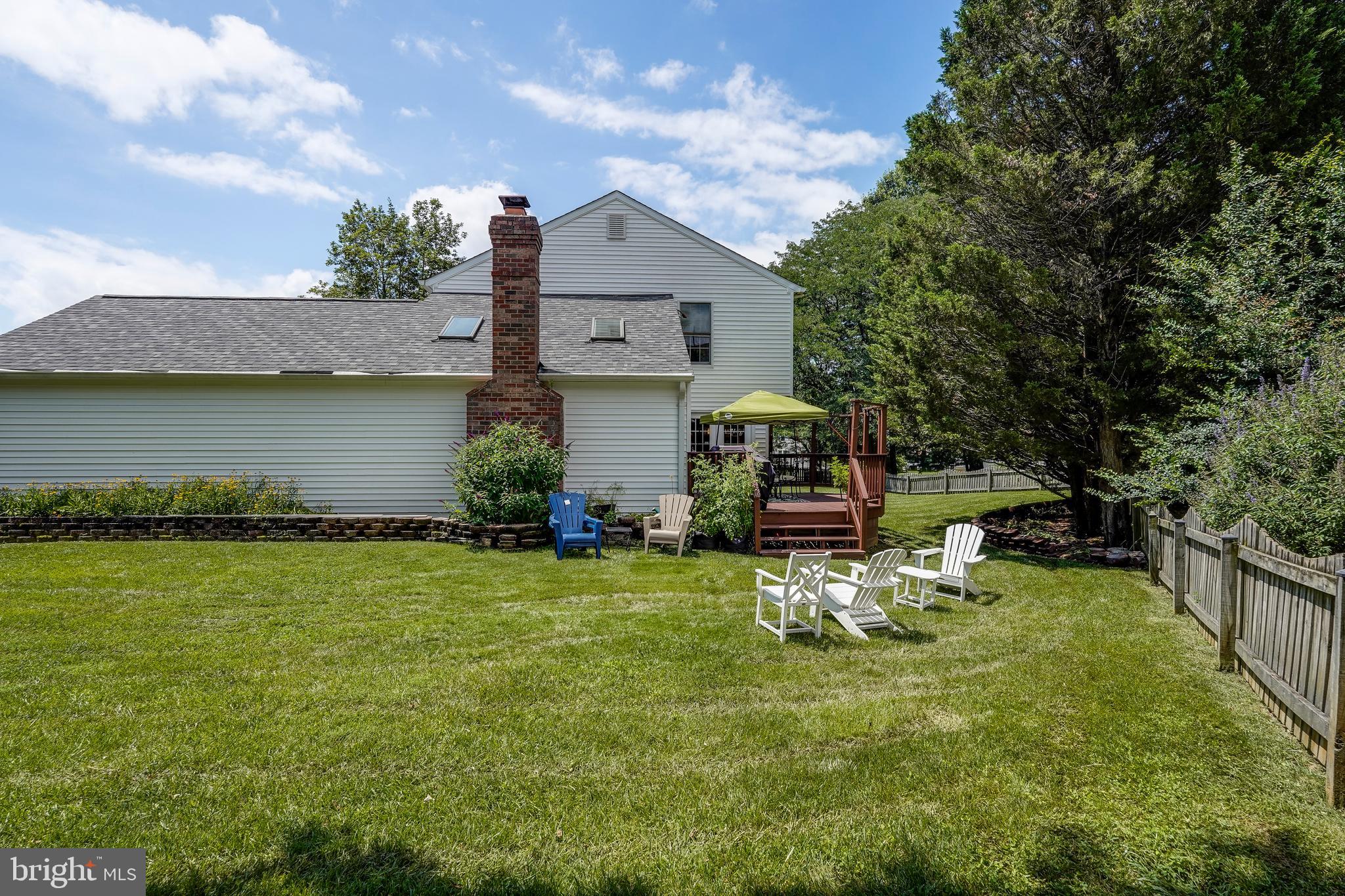 701 Stratford Manor Terrace Silver Spring, MD 20905 - Photo 38 of 43 a view of a chair and table on the garden