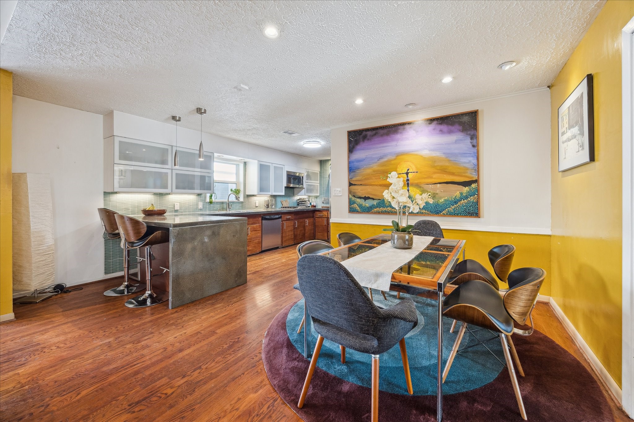 10102 Knoboak Drive Houston, TX 77080 - Photo 12 of 39 a view of a dining room with furniture and wooden floor