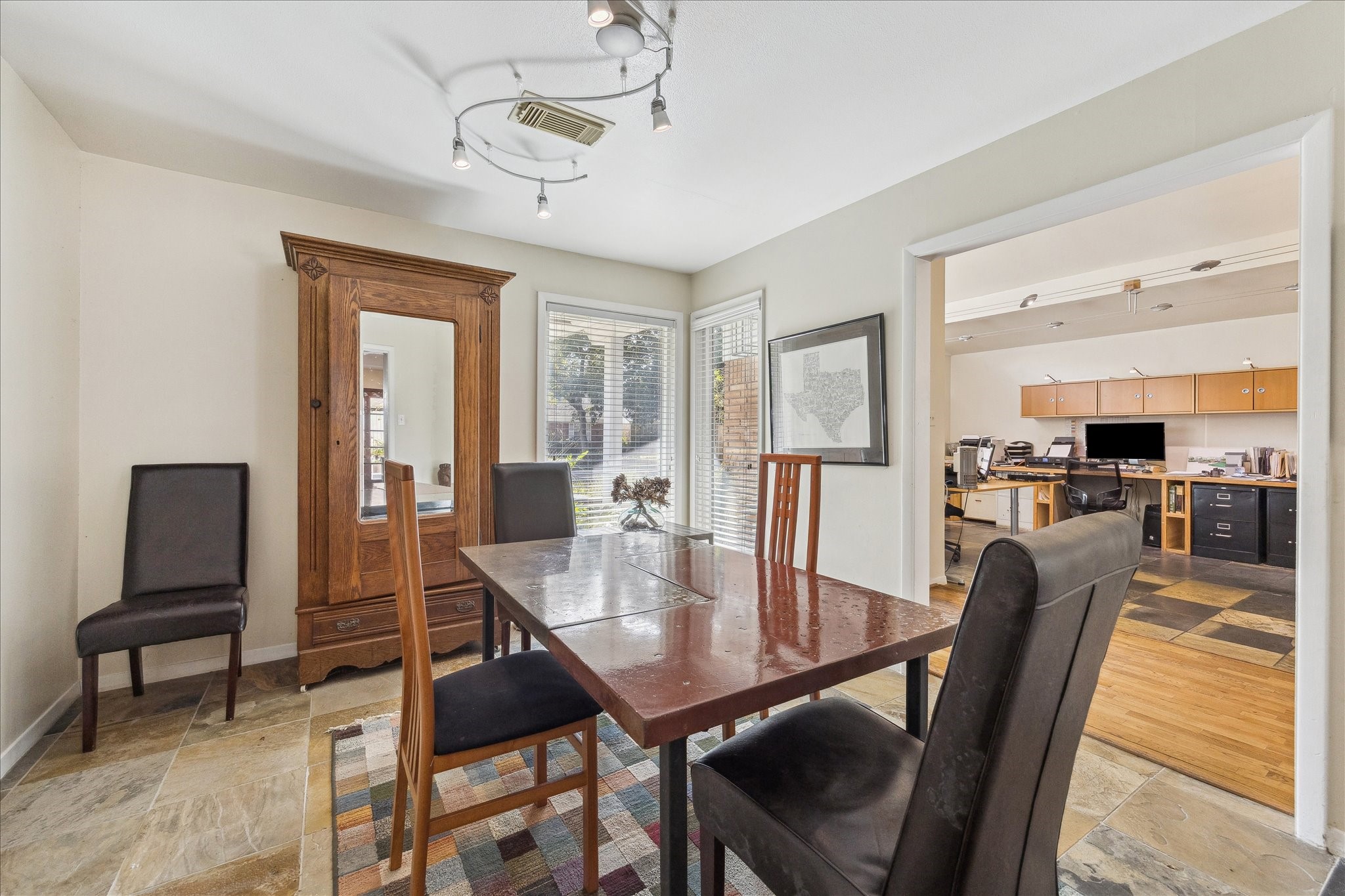 10102 Knoboak Drive Houston, TX 77080 - Photo 20 of 39 a view of a dining room with furniture window and wooden floor