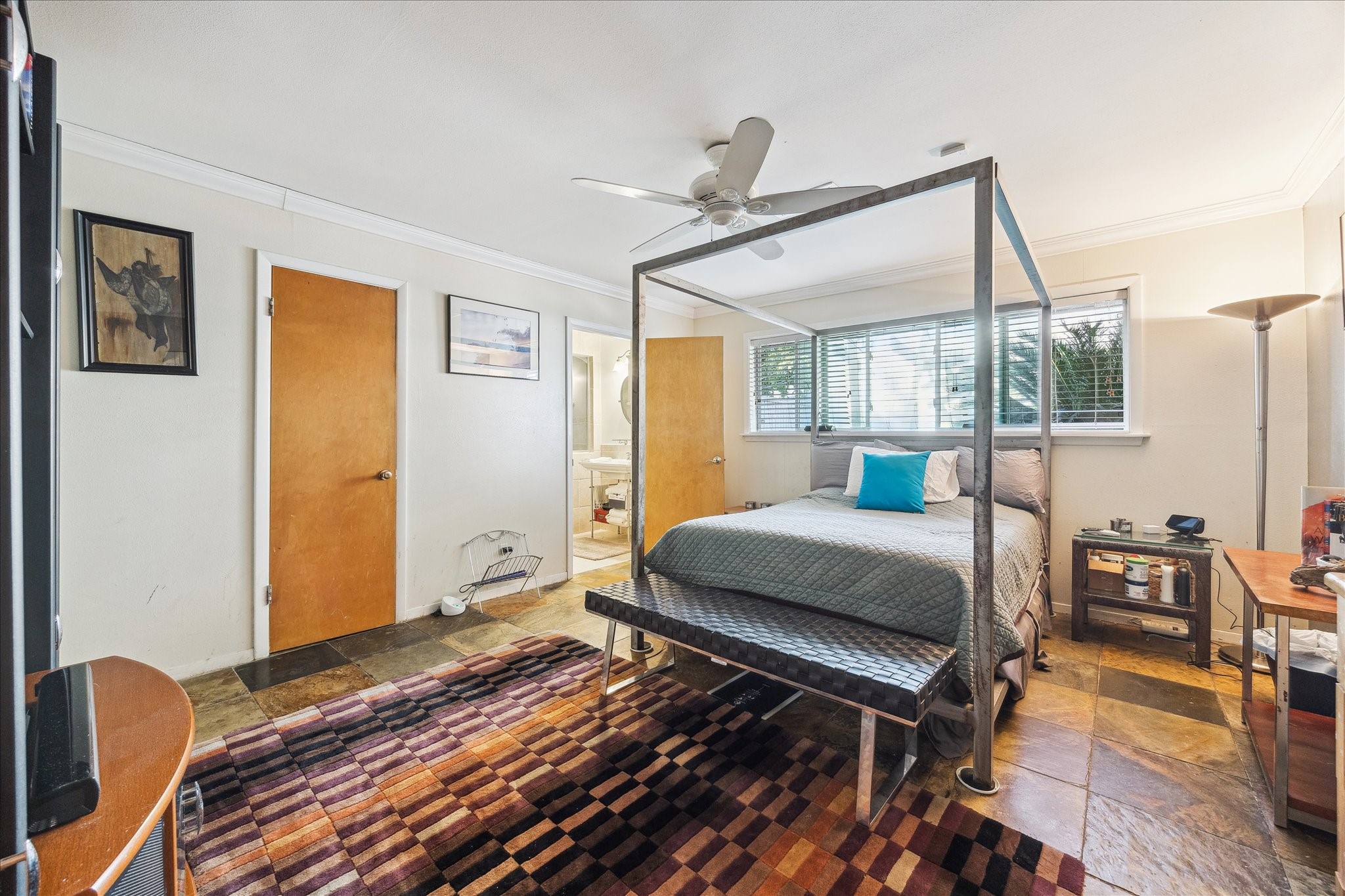 10102 Knoboak Drive Houston, TX 77080 - Photo 22 of 39 a bedroom with a bed wooden floor and window