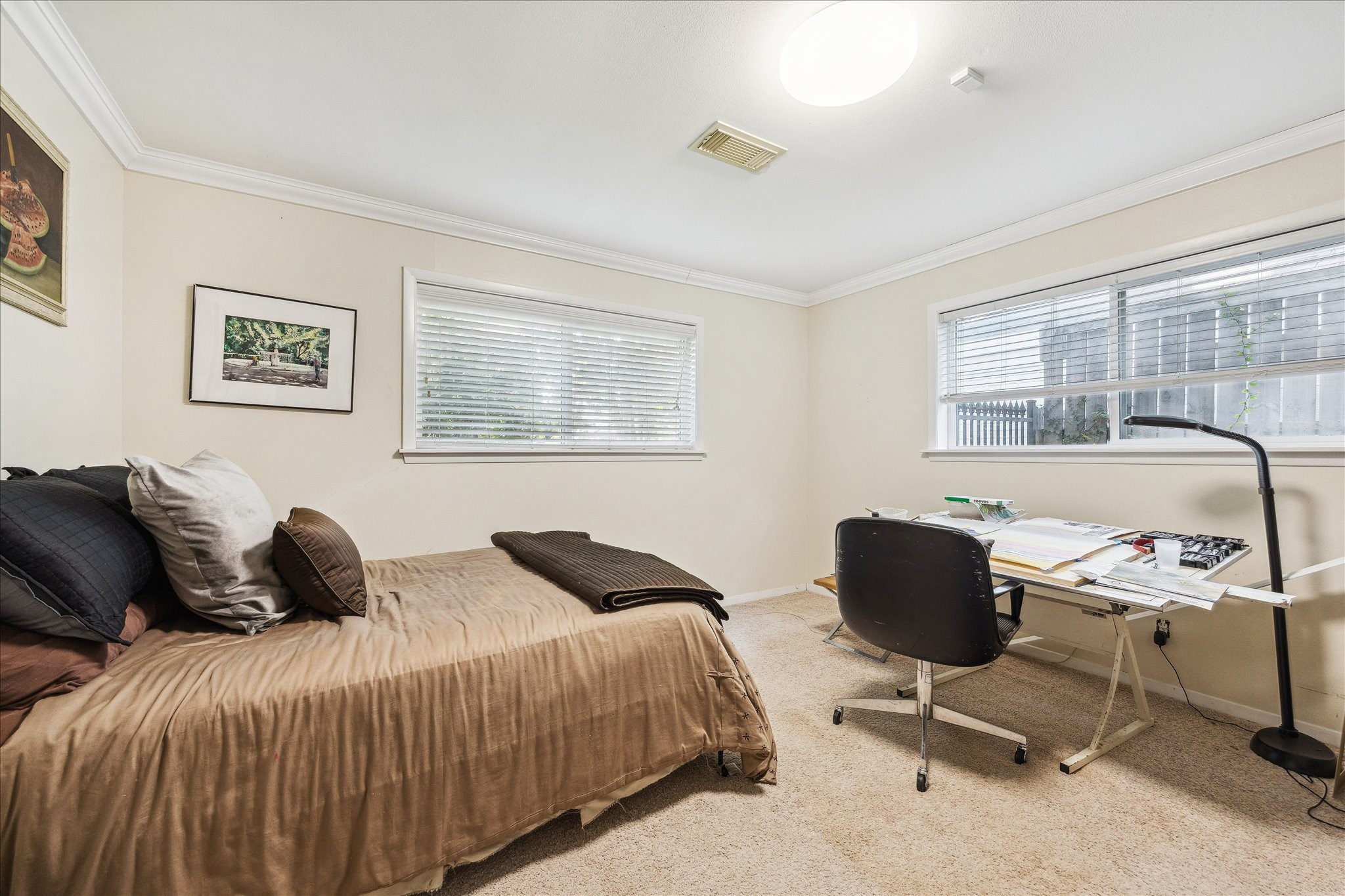 10102 Knoboak Drive Houston, TX 77080 - Photo 25 of 39 a bedroom with a bed and chair