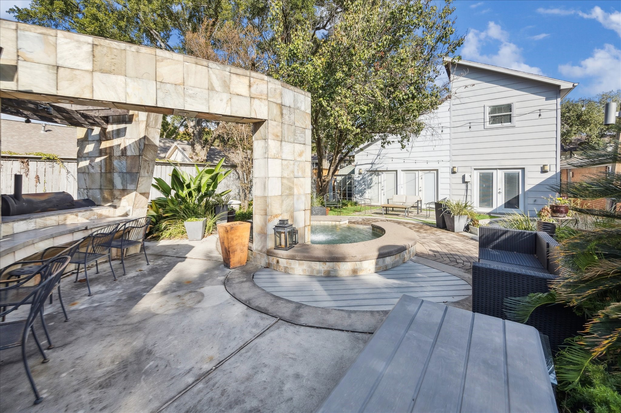 10102 Knoboak Drive Houston, TX 77080 - Photo 36 of 39 a view of outdoor space yard deck patio and fire pit