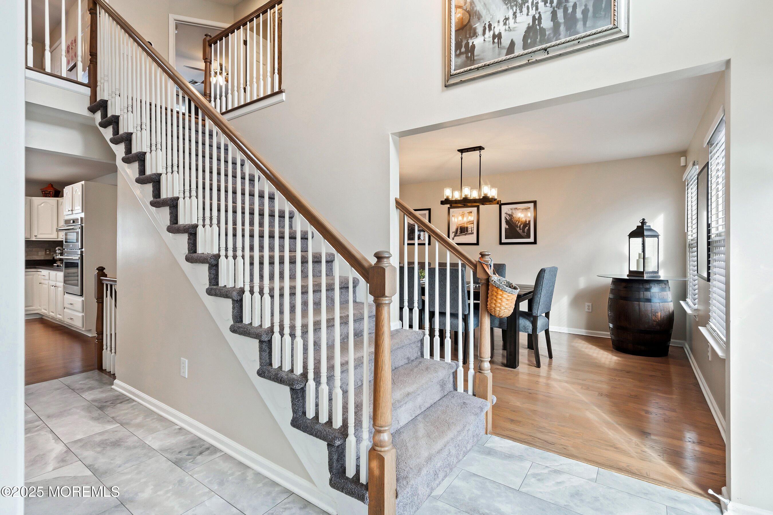 124 Barracuda Road Manahawkin, NJ 08050 - Photo 10 of 69 a view of entryway and hall with dining room