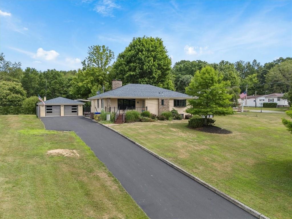 207 Ridge Avenue Freedom, PA 15042 - Photo 1 of 49 a aerial view of a house with swimming pool garden and patio