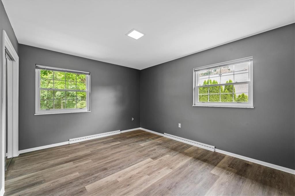 207 Ridge Avenue Freedom, PA 15042 - Photo 22 of 49 wooden floor in an empty room with a window