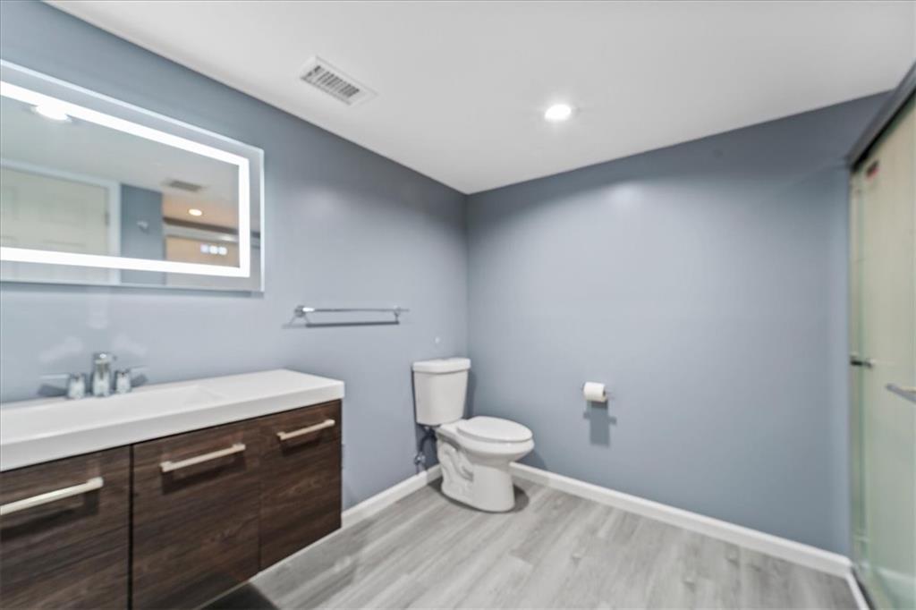 207 Ridge Avenue Freedom, PA 15042 - Photo 32 of 49 a bathroom with a toilet sink and mirror
