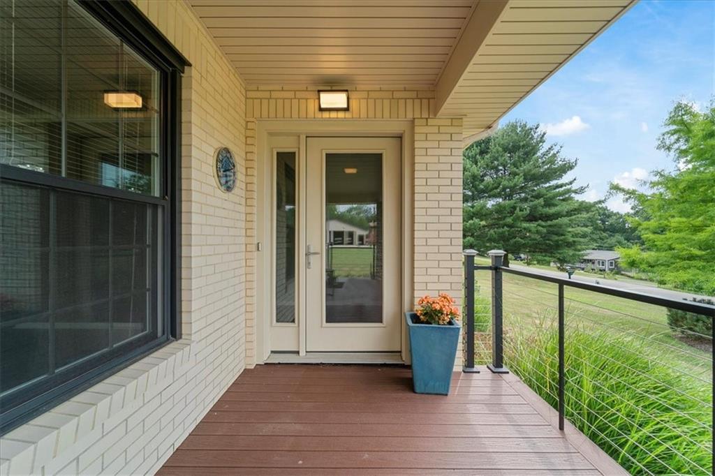 207 Ridge Avenue Freedom, PA 15042 - Photo 5 of 49 a view of a balcony with wooden floor