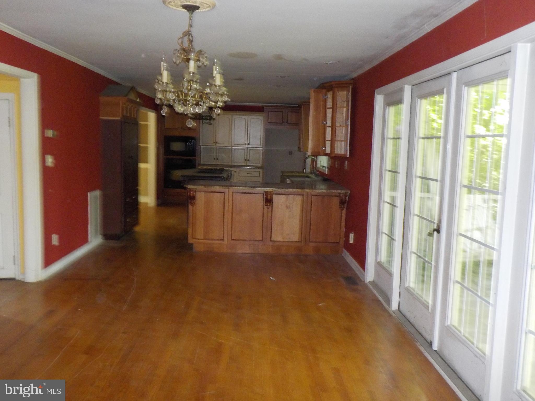 5448 Tates Bank Road Cambridge, MD 21613 - Photo 14 of 41 Open living area with hardwood floors