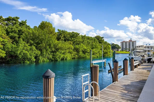 a view of a lake with sitting area