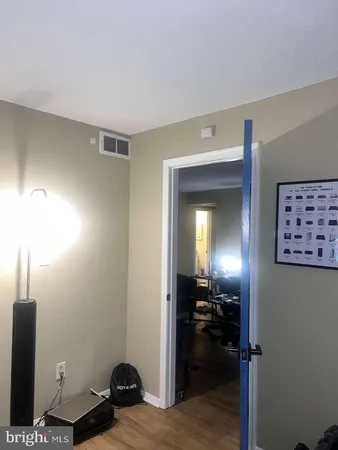 a room with furniture and musical instruments