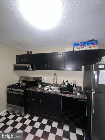 a view of a hallway with a workspace