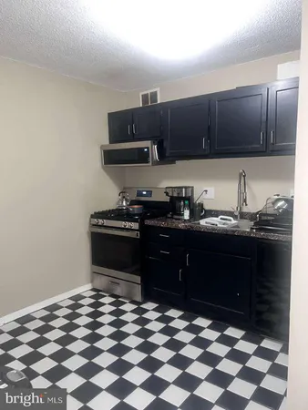 a view of room with a sink