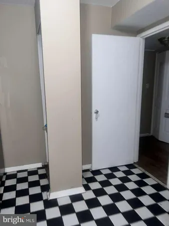 a black and white checkered floor with a black white checkered floor