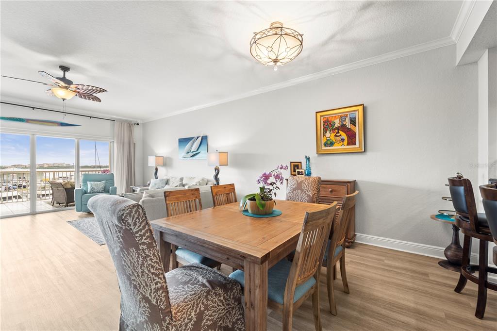 425 150th Avenue, Unit 2303 Madeira Beach, FL 33708 - Photo 13 of 69 a view of a dining room with furniture