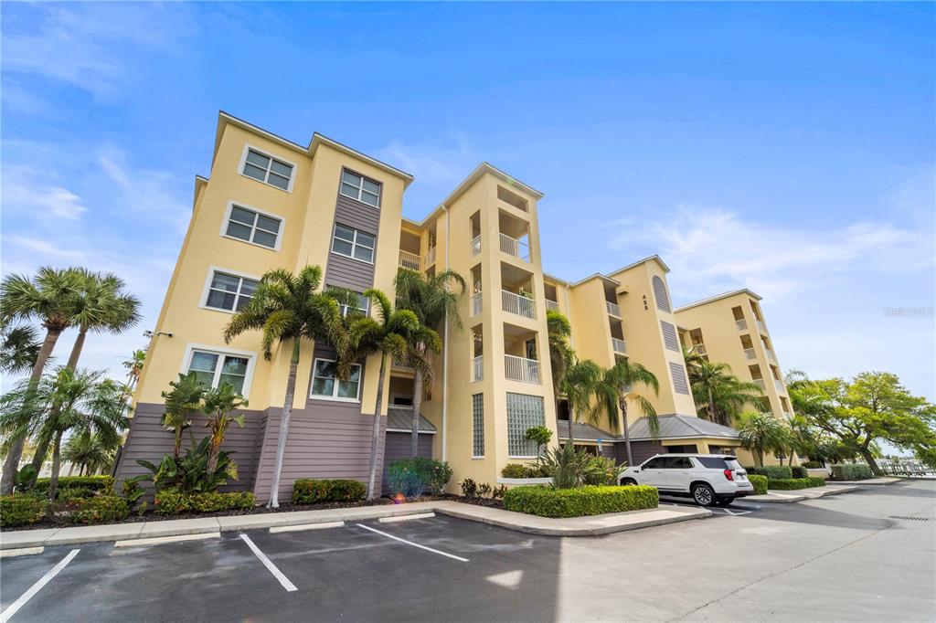 425 150th Avenue, Unit 2303 Madeira Beach, FL 33708 - Photo 2 of 69 a front view of a building