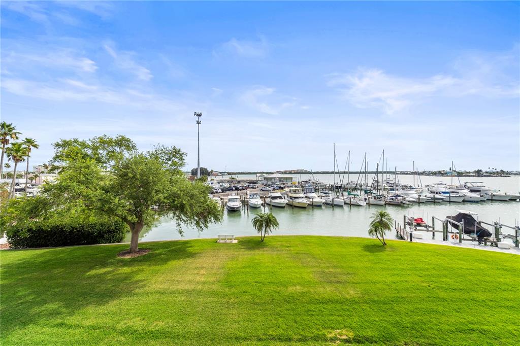 425 150th Avenue, Unit 2303 Madeira Beach, FL 33708 - Photo 25 of 69 a view of a lake with a big yard