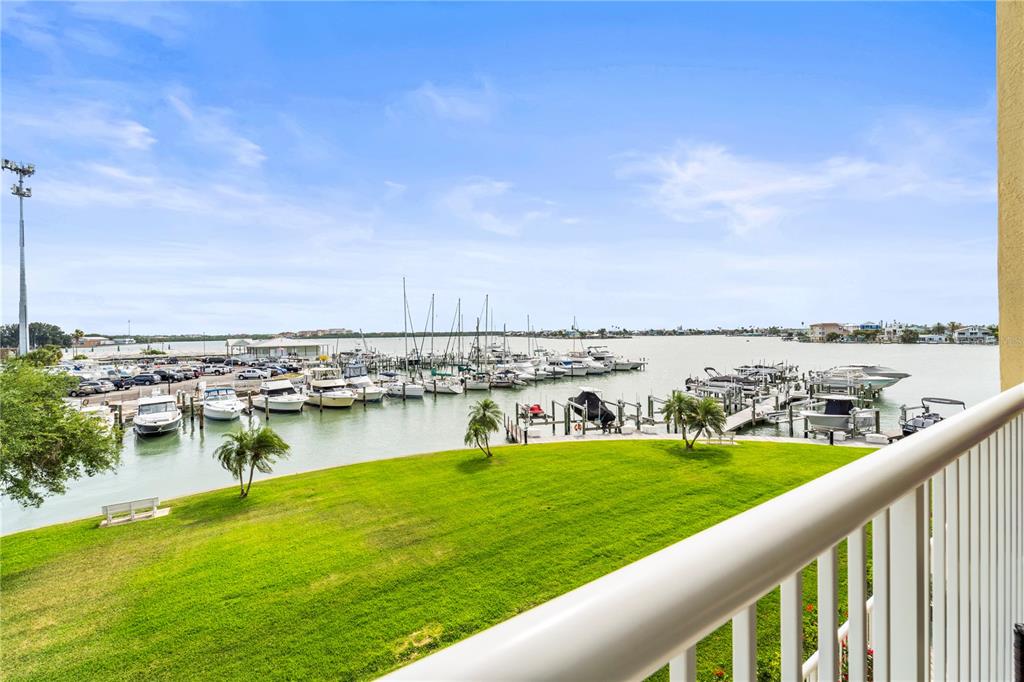 425 150th Avenue, Unit 2303 Madeira Beach, FL 33708 - Photo 26 of 69 a view of swimming pool from a balcony with outdoor space