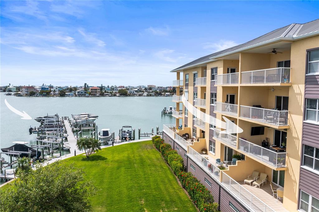 425 150th Avenue, Unit 2303 Madeira Beach, FL 33708 - Photo 3 of 69 a view of balcony with city and ocean view