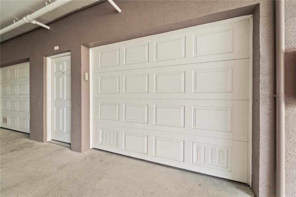 425 150th Avenue, Unit 2303 Madeira Beach, FL 33708 - Photo 51 of 69 an empty room with white cabinets