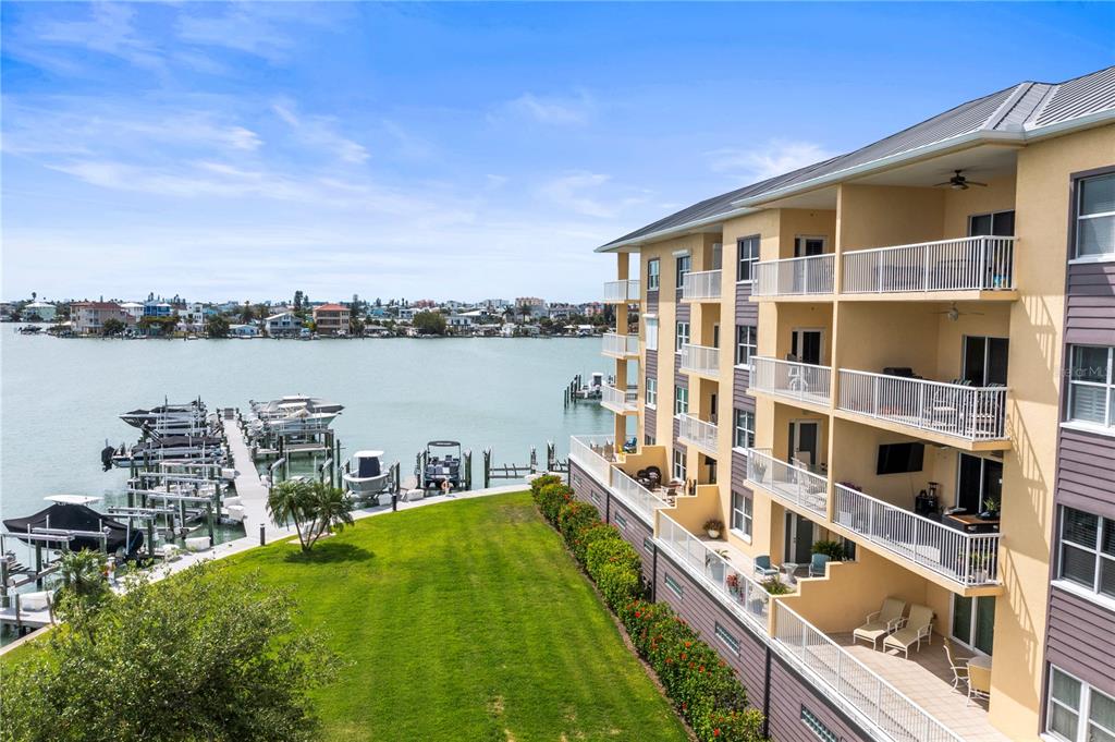 425 150th Avenue, Unit 2303 Madeira Beach, FL 33708 - Photo 57 of 69 a view of balcony with city and ocean view