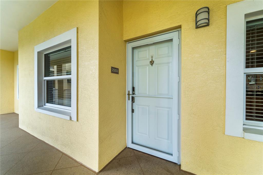 425 150th Avenue, Unit 2303 Madeira Beach, FL 33708 - Photo 62 of 69 a view of front door