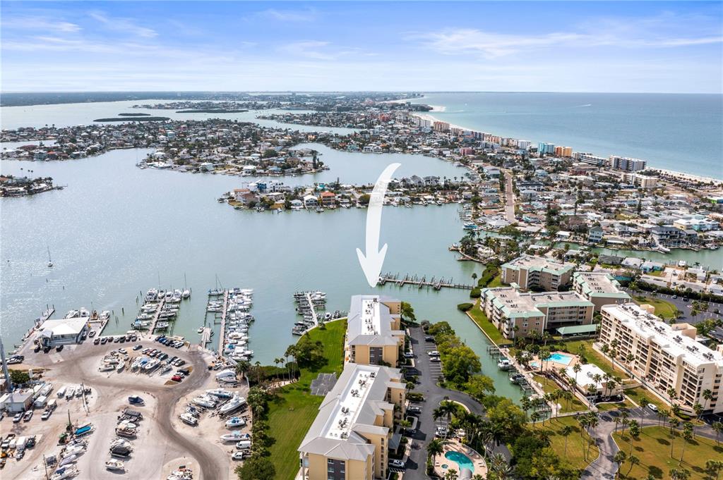 425 150th Avenue, Unit 2303 Madeira Beach, FL 33708 - Photo 66 of 69 an aerial view of multiple house