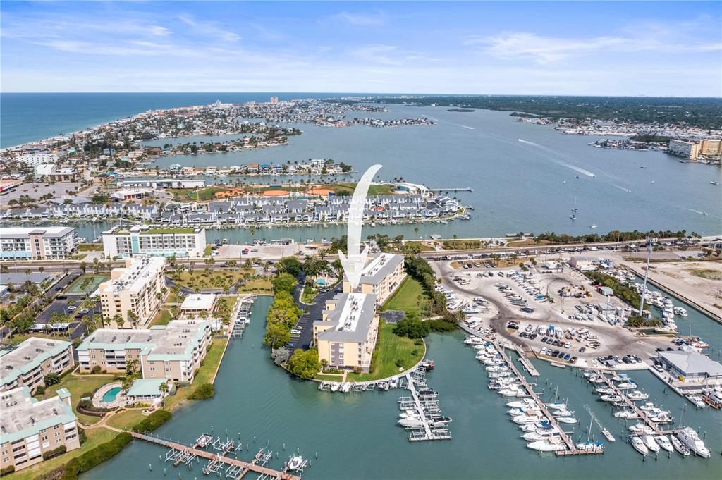 425 150th Avenue, Unit 2303 Madeira Beach, FL 33708 - Photo 68 of 69 an aerial view of residential building and ocean