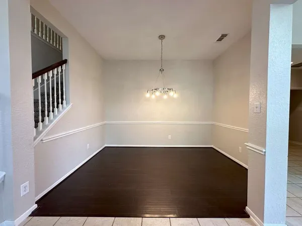 a kitchen with stainless steel appliances a refrigerator sink and cabinets
