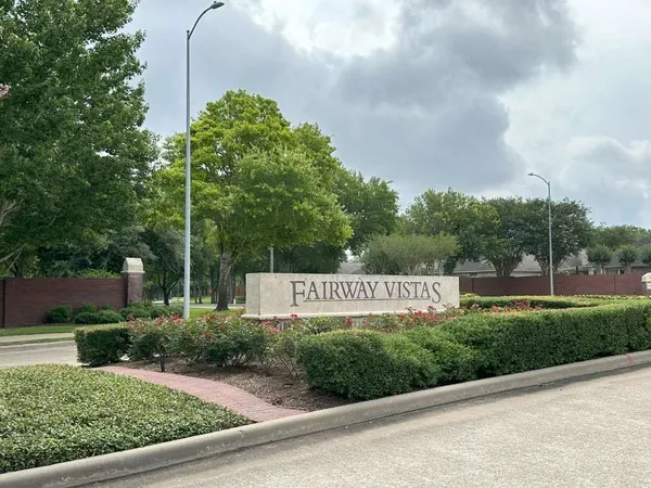 a sign on the side of a road