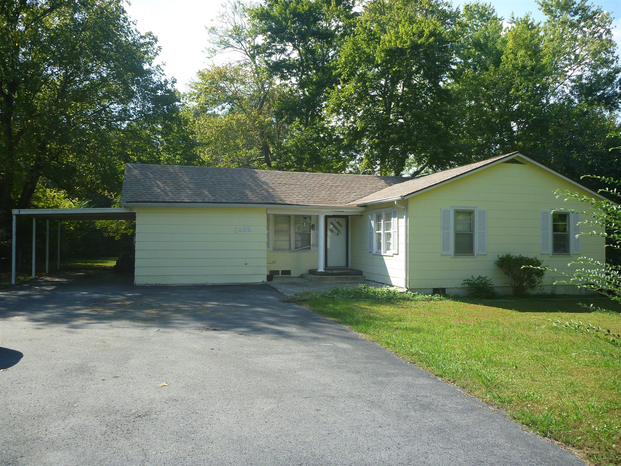 View including carport and driveway.