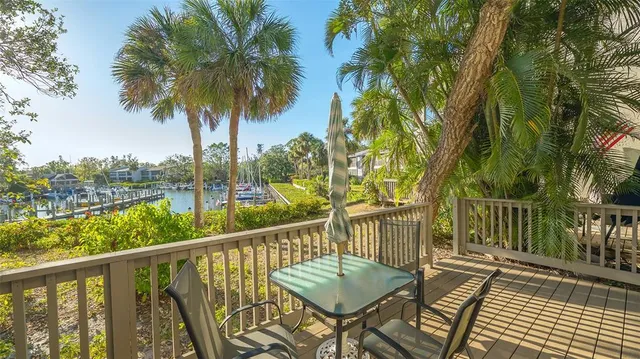 a view of balcony with furniture