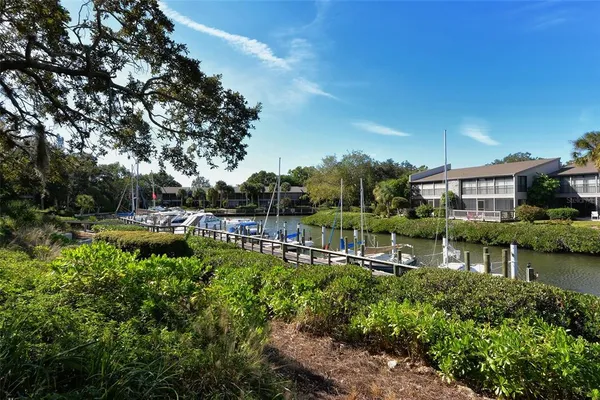 an aerial view of residential house with outdoor space and swimming pool