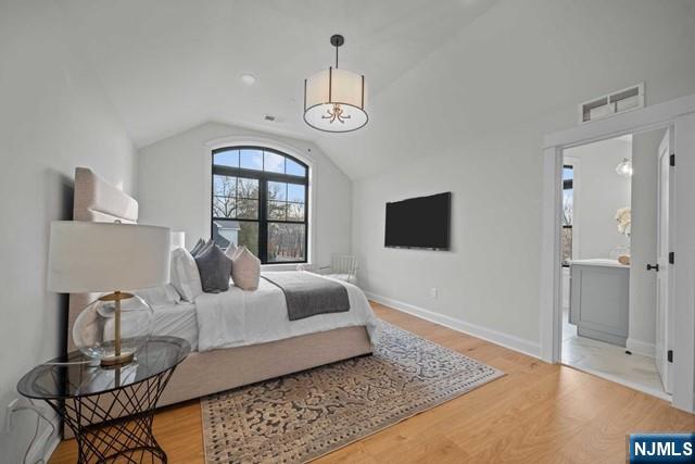 147 Central Avenue, Unit 20 Old Tappan, NJ 07675 - Photo 22 of 50 a living room with furniture and a window
