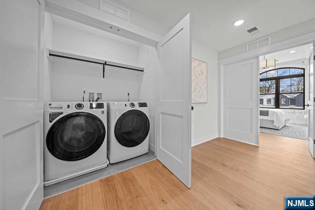 147 Central Avenue, Unit 20 Old Tappan, NJ 07675 - Photo 33 of 50 a view of a hallway with washer and dryer