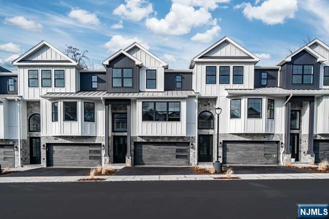 147 Central Avenue, Unit 20 Old Tappan, NJ 07675 - Photo 48 of 50 a front view of a house with a yard